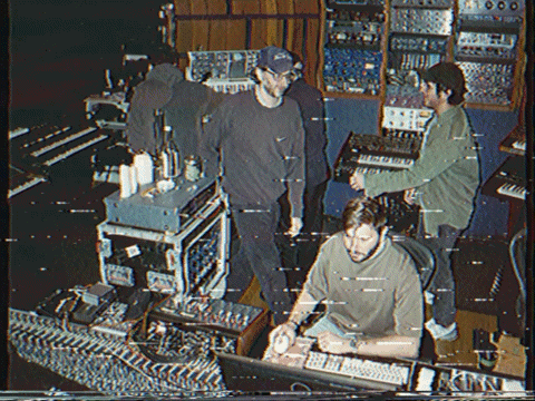 Tommy Rush at the mixing console, the studio behind the glass